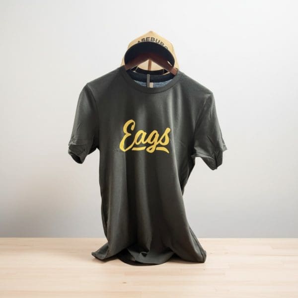 EAGS Script Line Tee in Vintage Black with gold script